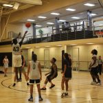 Students playing Intramural Sports Basketball in the RWC MAC Gym.