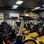 RWC cycle studio showing 2 rows of cycle stationary bikes.
