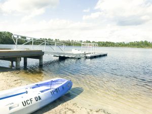 Lake Claire boat dock with kayak in the foreground.